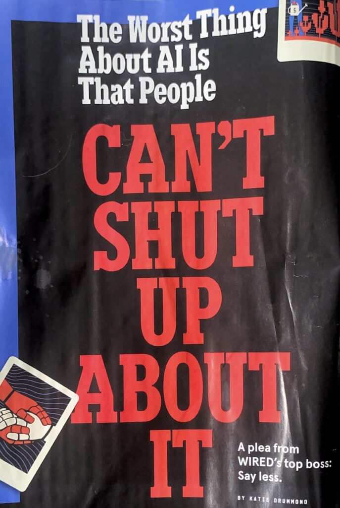 A photo of a page from WIRED magazine that reads, "The Worst Thing About AI Is That People CAN'T SHUT UP ABOUT IT," with the capitalized letters in large red font. Then: "A Plea From WIRED's top boss: Say less. BY KATIE DRUMMOND" 